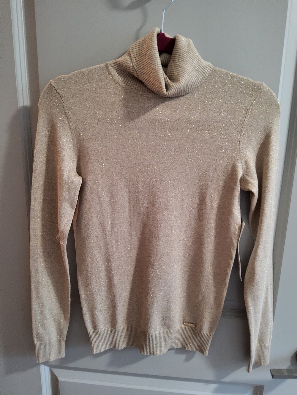 Calvin Klein gold shimmer turtle neck sweater